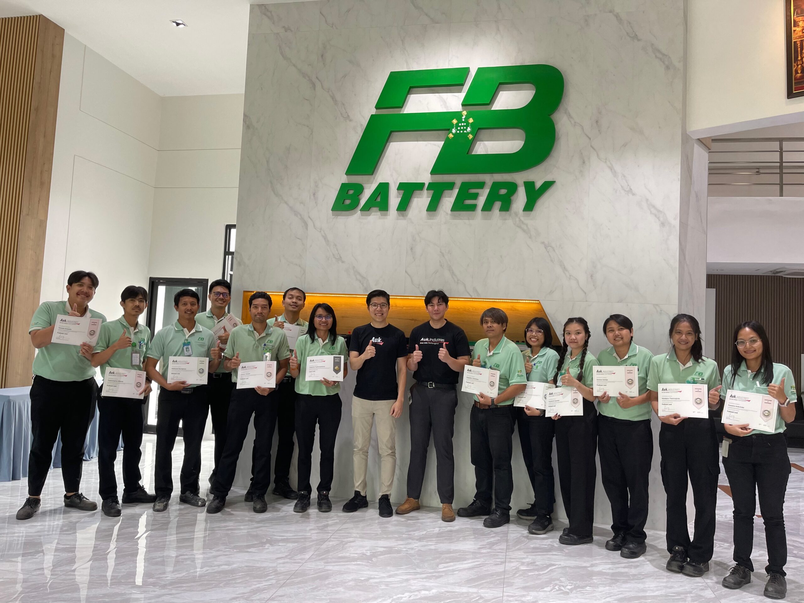 FB Battery team with their certificates, alongside the Auk team